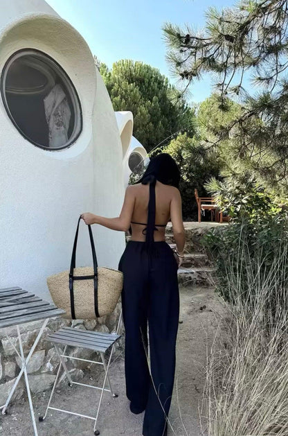 Ensemble femme noir avec haut dos nu à nouer et pantalon large fluide