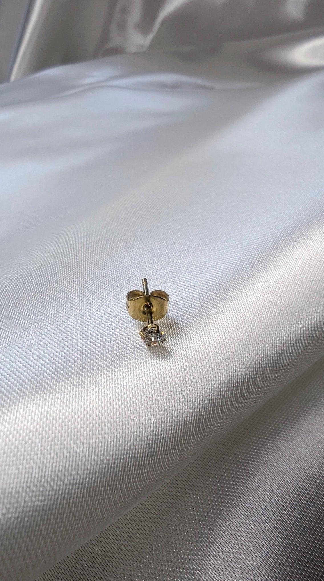 Boucle d’oreille diamant (pièce )
