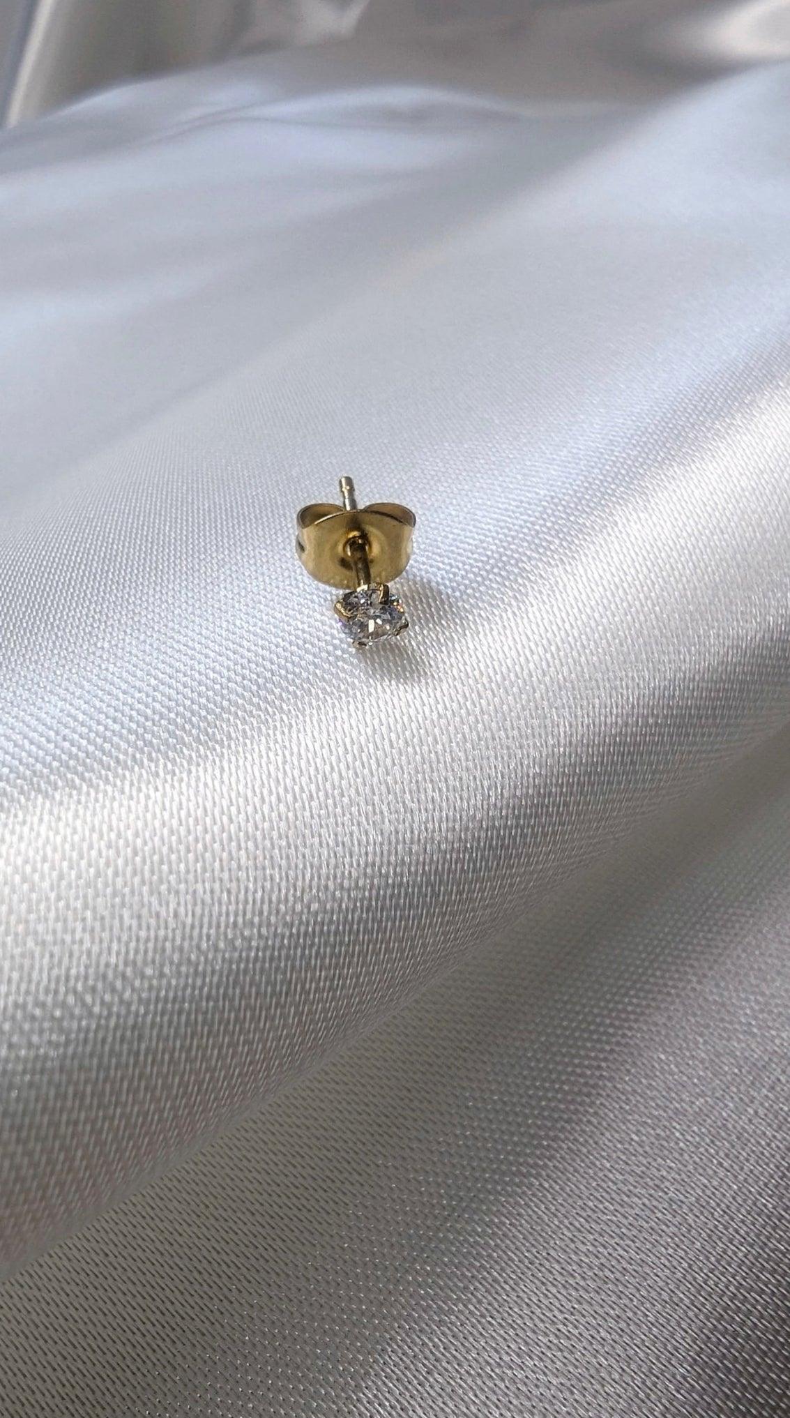Boucle d’oreille diamant (pièce )