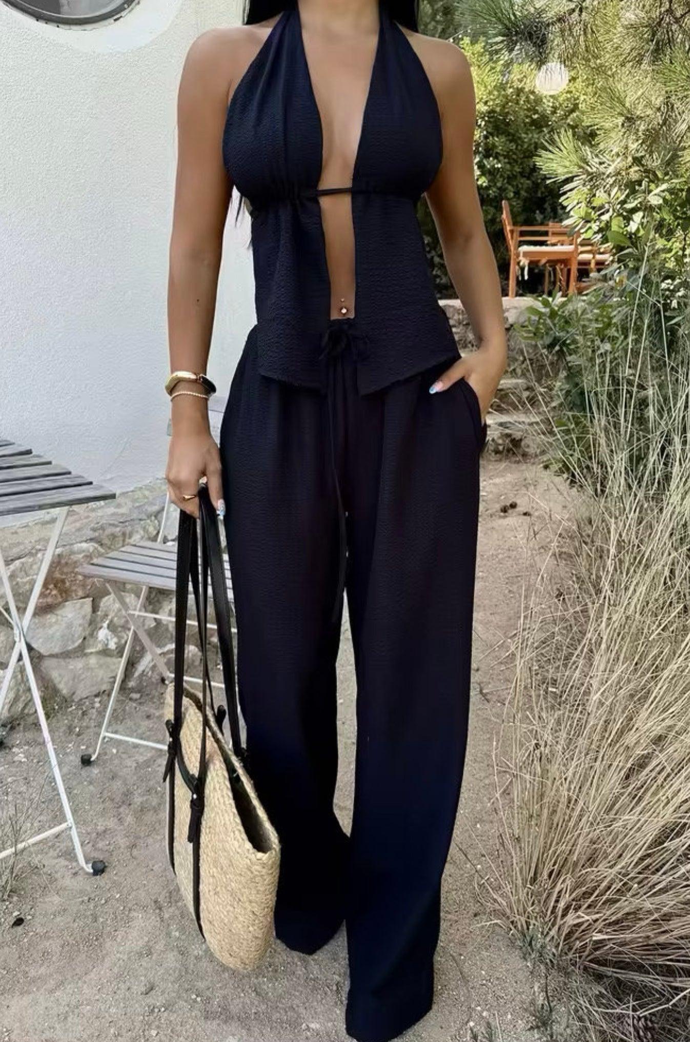 Ensemble femme noir avec haut dos nu à nouer et pantalon large fluide